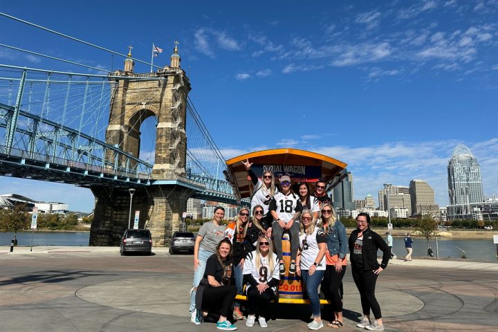 a group of people on a bridge
