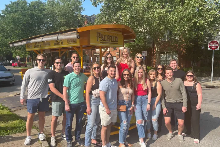 a group of people standing in front of a crowd