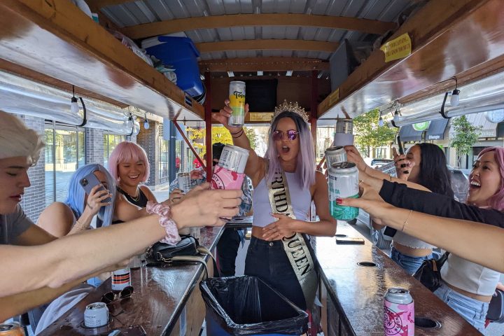 a group of people sitting at a train station