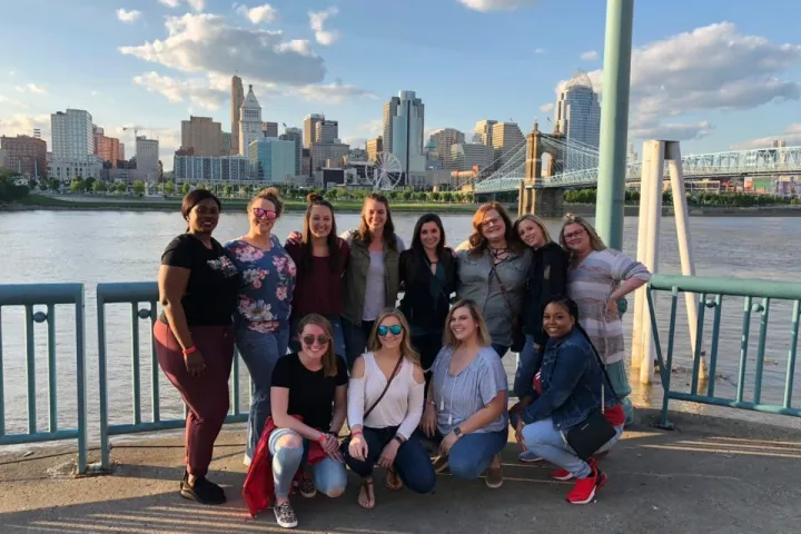 a group of people posing for the camera