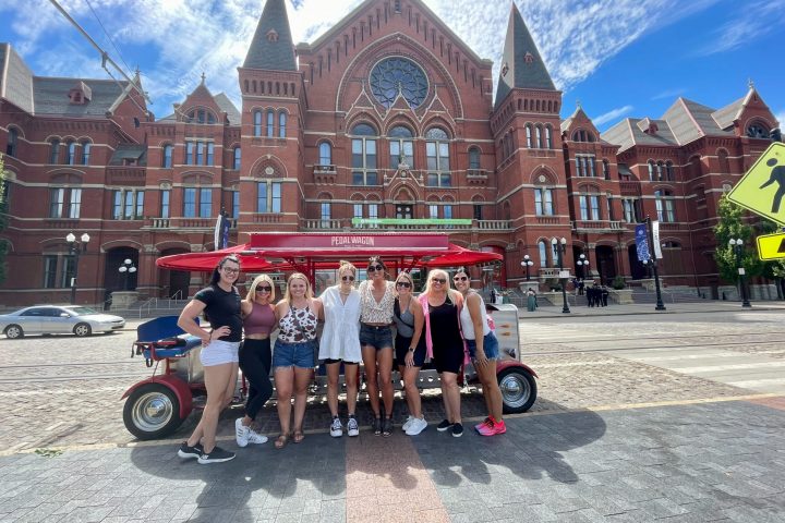 a group of people standing in front of a building