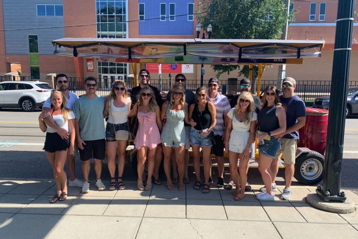 a group of people standing in front of a building