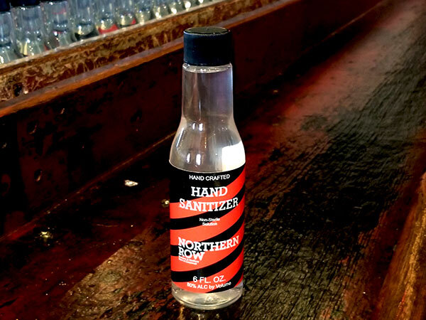 an empty bottle sitting on a table