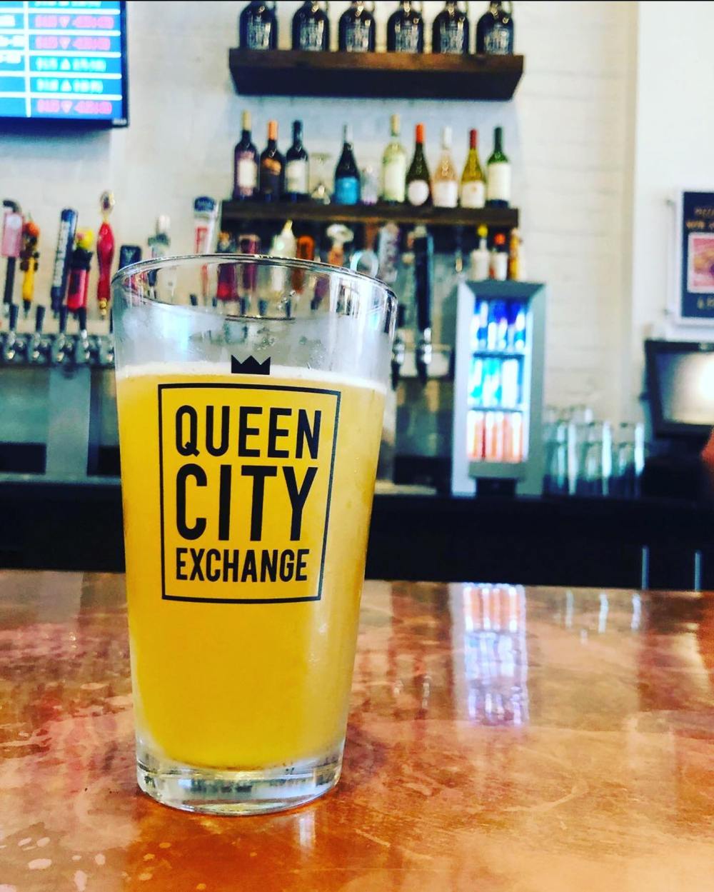 a glass of beer on a table