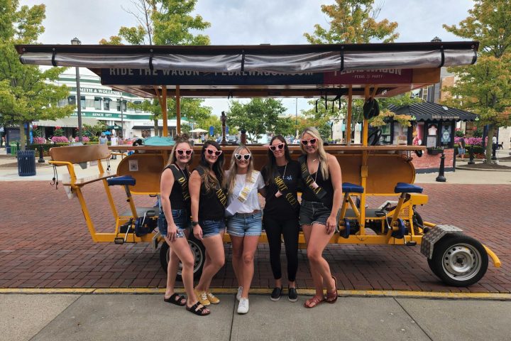 a group of people standing in front of a building