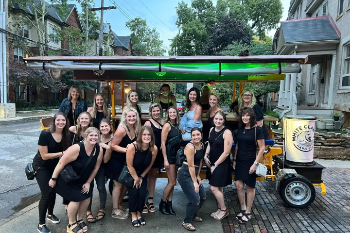 a group of people that are standing in the street