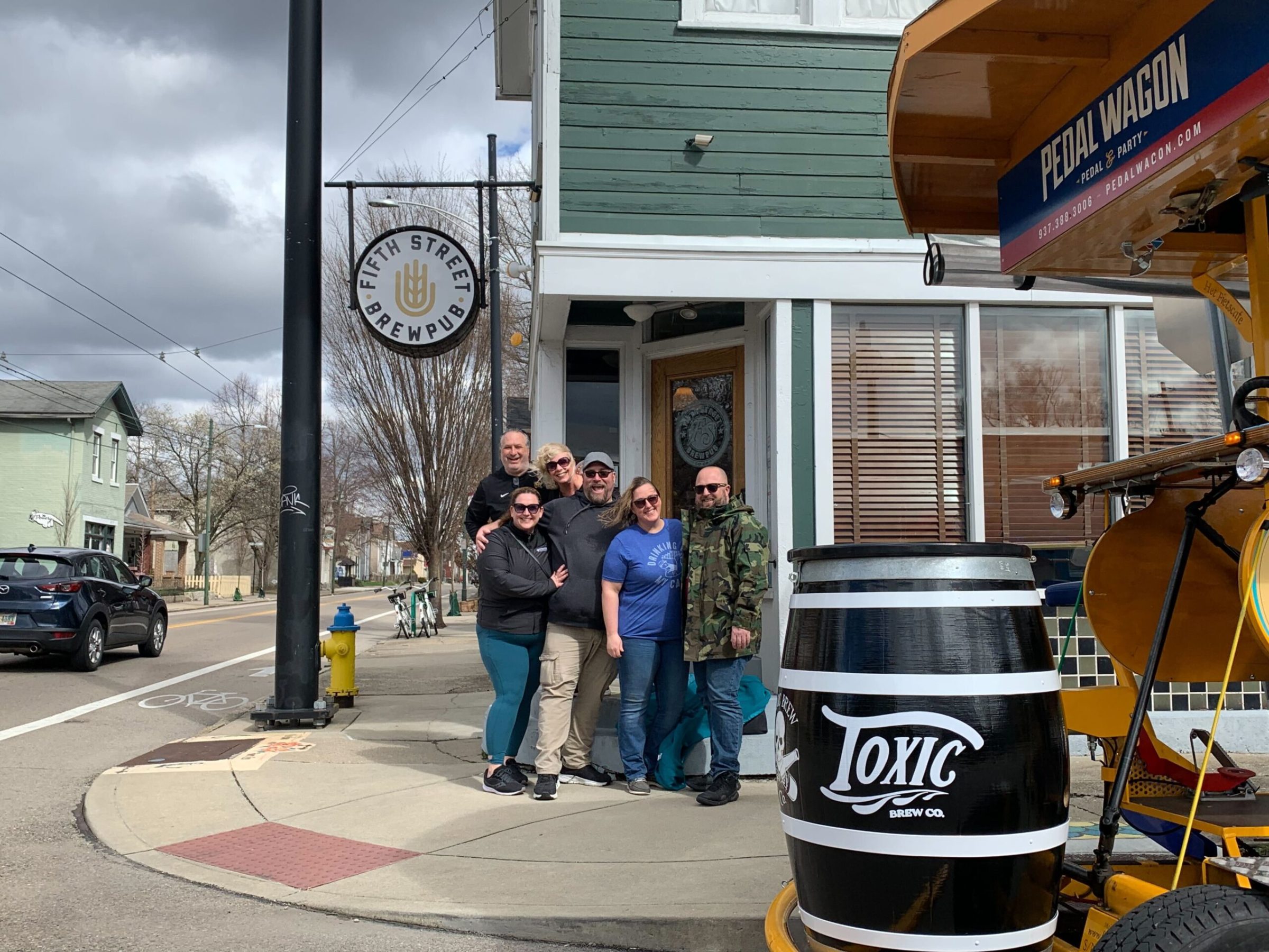 a group of people standing in front of a building