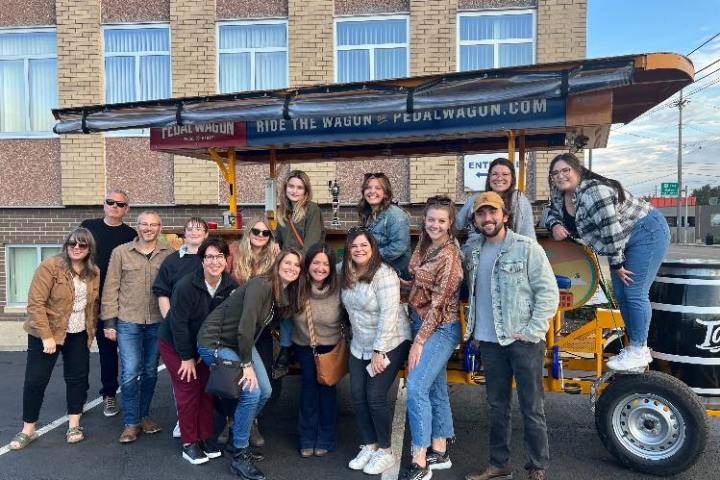 a group of people standing in front of a building